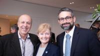Three ACE members at a induction ceremony reception